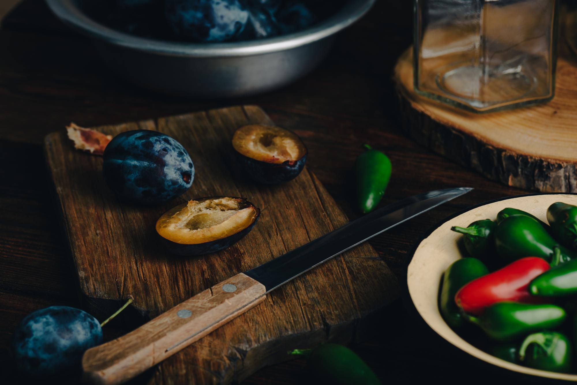close-up of seasonal produce and plating tools